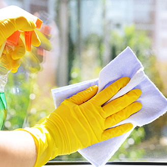 stock-photo-cleaning-windows-with-special-rag-and-cleaner-217647517