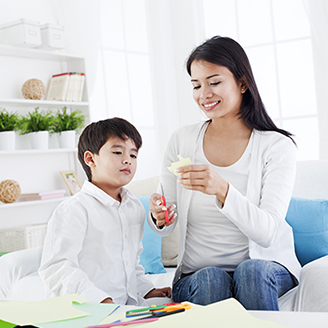 stock-photo-preschool-child-and-his-mother-cutting-craft-in-their-living-room-mother-is-helping-her-son-to-167292671